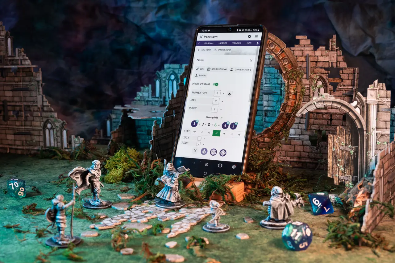 Miniatures standing before Pocketforge app in a fantastical surroundings